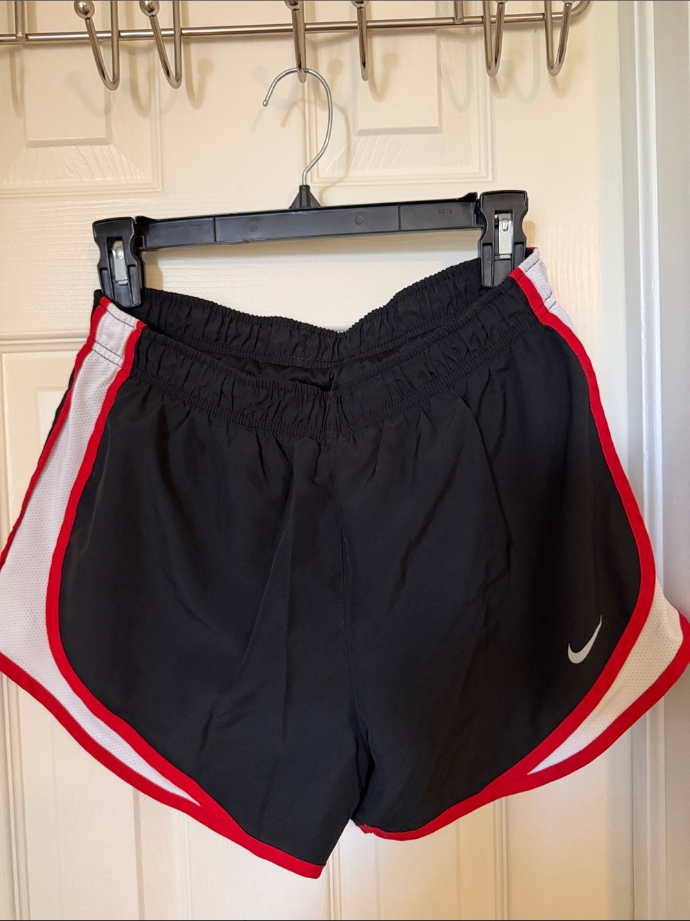 Nike Black Athletic Shorts with Red Trim and White Panels